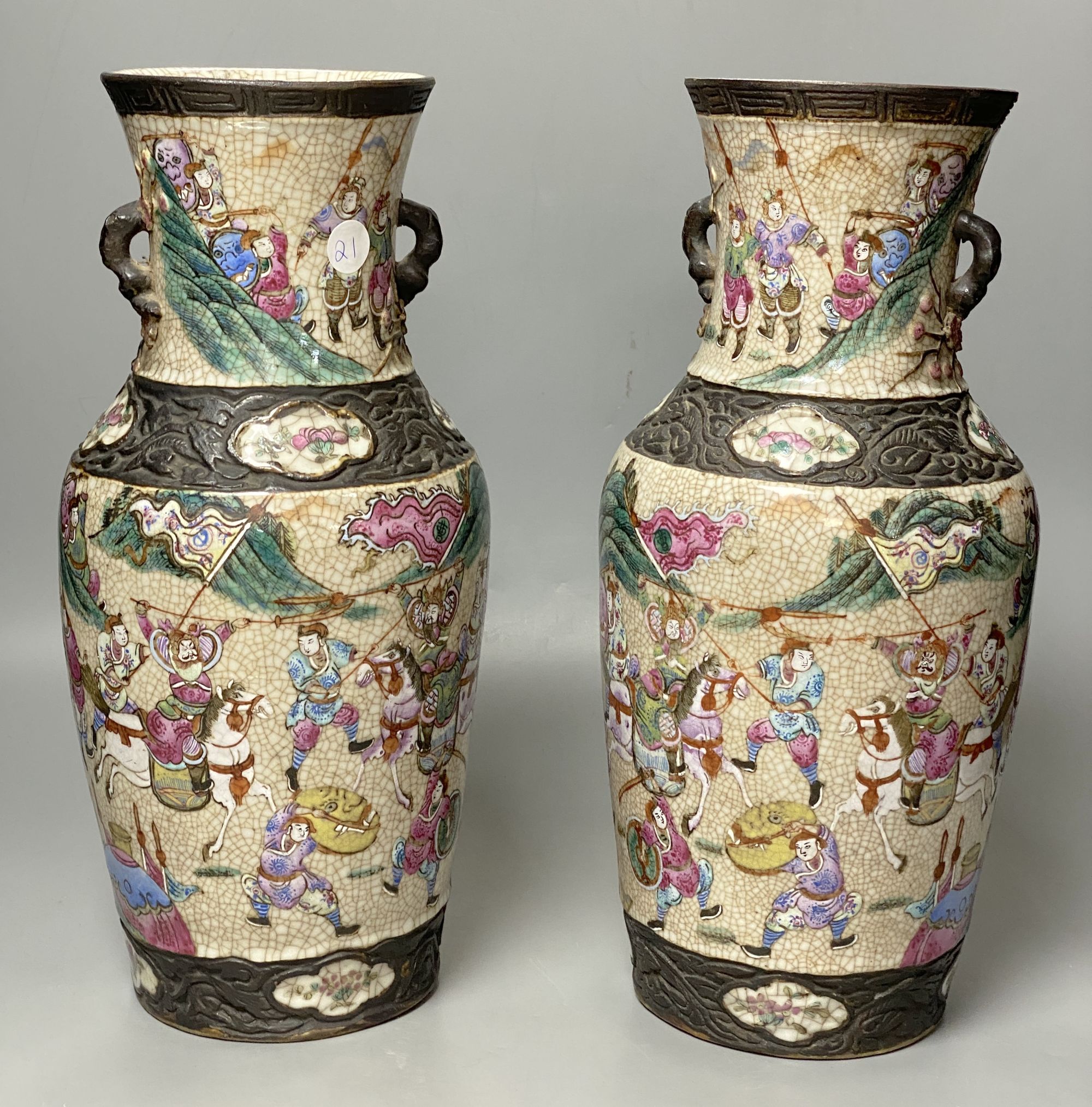 A pair of Chinese famille rose crackleglaze vases, height 36cm